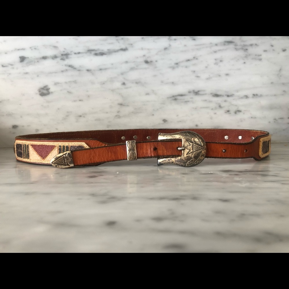Hand painted with real vintage buffalo nickels.  Measures 40”.